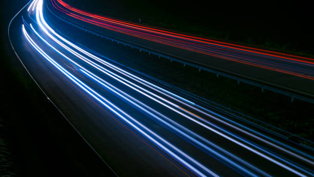 istock abstract red car lights at night. long exposure 1393849320