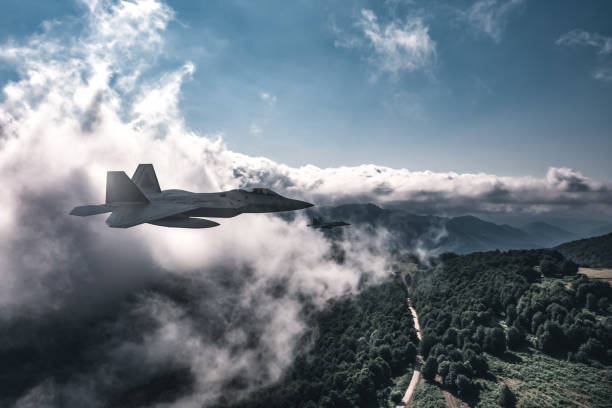 istock Jet fighters flying over the clouds. 1393850234