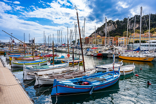 Nice, France - April 3 2022 - boats waiting for a sail in the Lympia port (porte de Nice Lympia)