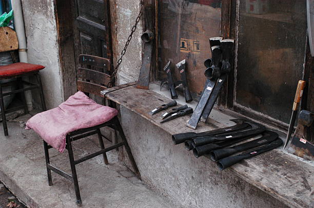Street scene in Turkish village of Beypazari with farm implements and chair.