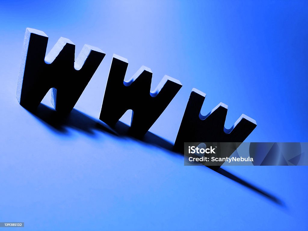 dot com blue A heavily silhouetted "www" on a bright blue background. Black Color Stock Photo