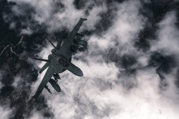 istock Jet fighters flying over the clouds. 1393851452