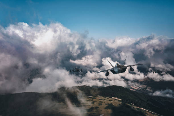 istock Jet fighters flying over the clouds. 1393851898