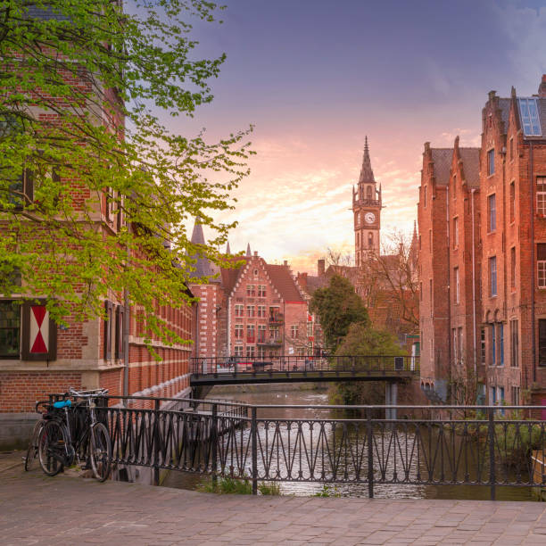 istock Ghent canal, clock tower, Belgium 1393855501