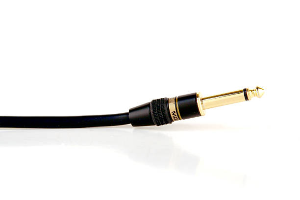Cable On white. Focus on middle, right. amplifier plug stock pictures, royalty-free photos & images
