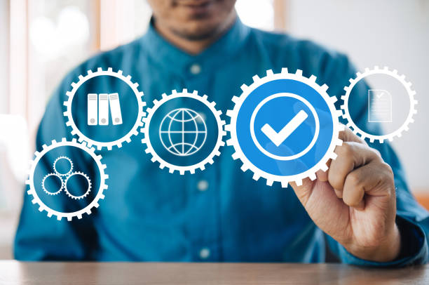 istock Concept with manager or auditor. quality management with QA (assurance), QC (control) and improvement. Standardization and certification concept. 1393857096