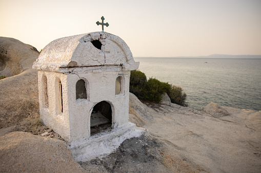 Small church on the beach near sea