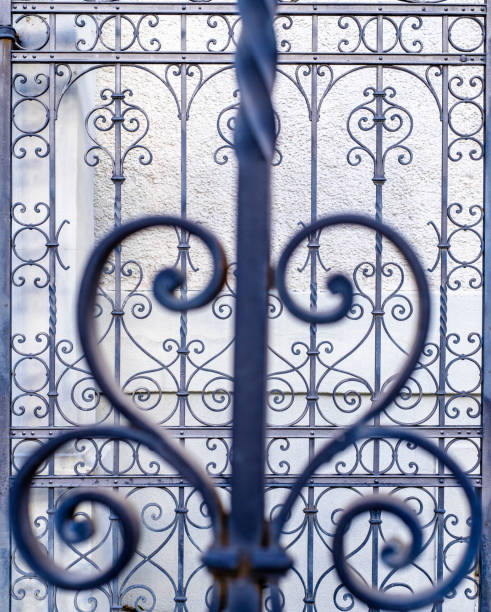 istock old iron fence - close up 1393858508