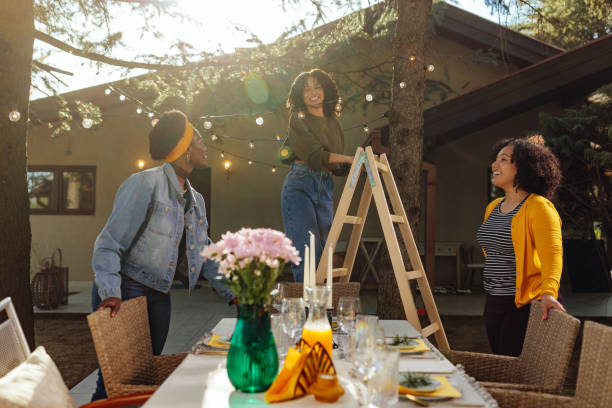 istock Setting light bulb decor in outdoor party 1393858645