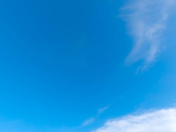 istock blue sky with a few white clouds, great for a background color rush 1393859804