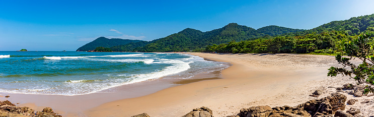 Panoramic image of Praia Branca (White Beach) located in the city of Bertioga and surrounded by rainforest on the coast of Sao Paulo, Brazil
