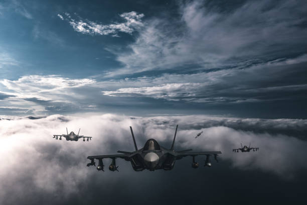 istock Jet fighters flying over the clouds. 1393862762