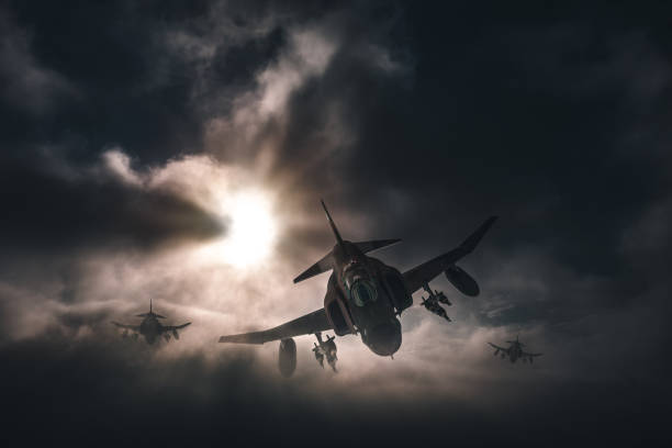 istock Jet fighters flying over the clouds. 1393863884