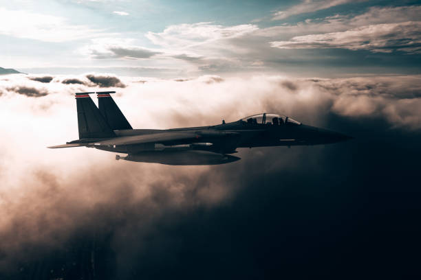istock Jet fighters flying over the clouds. 1393866856