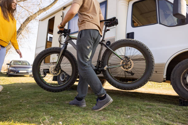 istock Unrecognizable man carrying the bicycle 1393867398