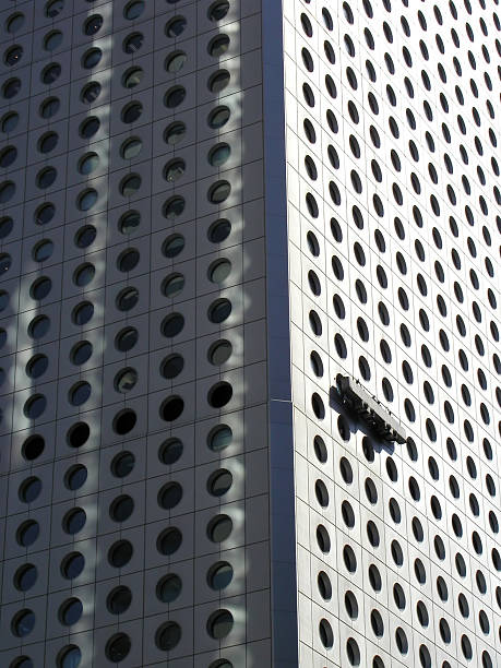 glass cleaner against building stock photo