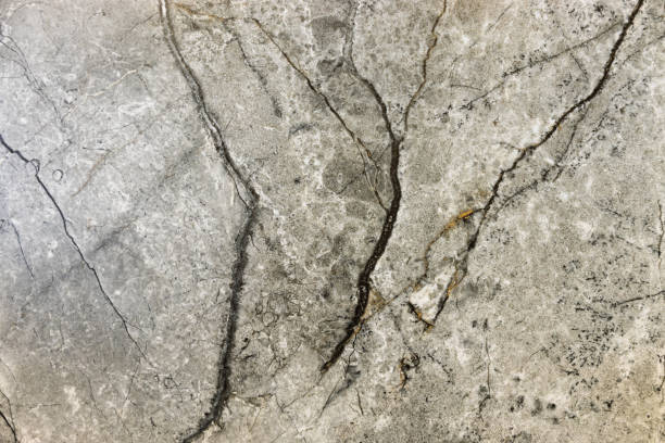 istock Stone rust texture or background with corrosion spots and deep crack 1393869171