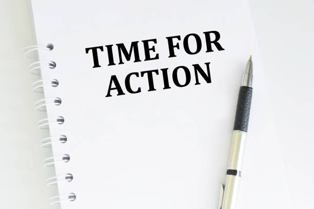 istock Time for action text on a white notepad on the table, business concept 1393869391