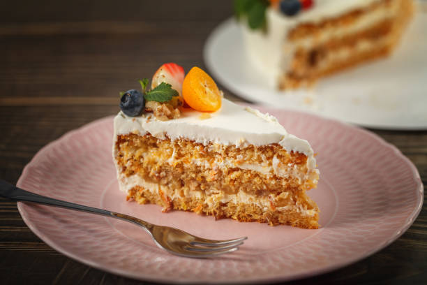 istock Carrot-orange cake for diabetics decorated with fresh fruit and mint 1393870234