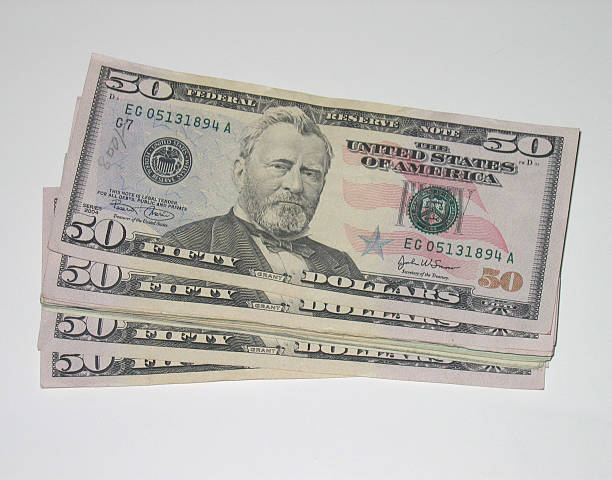 istock Stack of Fifty Dollar Bills 139387239