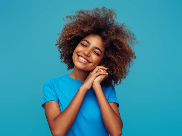 istock Beautiful afro woman 1393873287