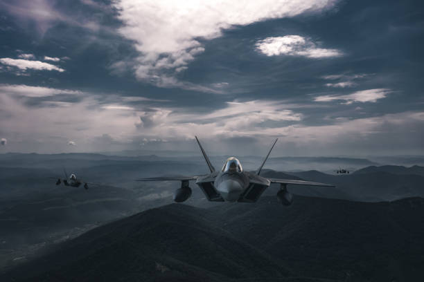 istock Jet fighters flying over the clouds. 1393876465