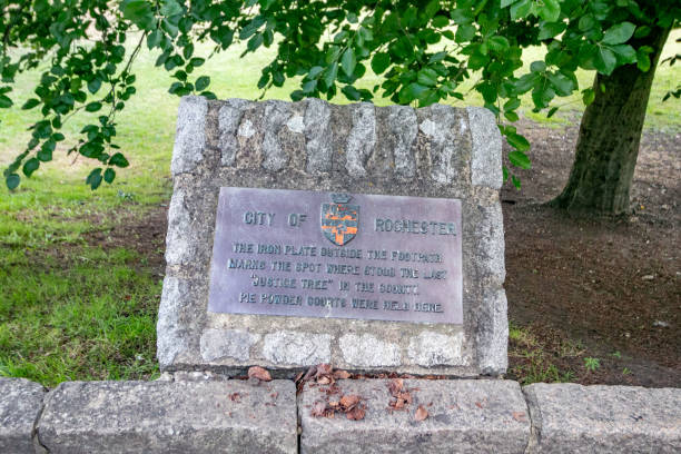istock 'Justice Tree' Plaque at Rochester in Kent, England 1393876496
