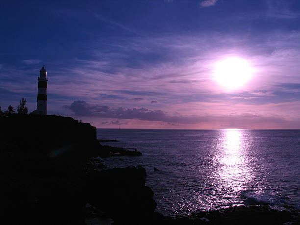 Sunset at the lighthouse stock photo