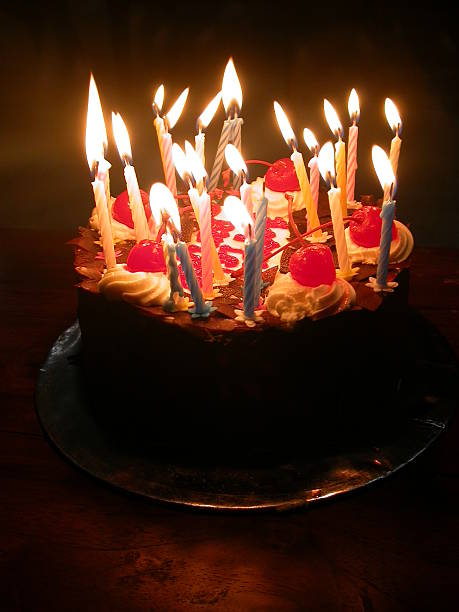 Birthday cake with candles stock photo