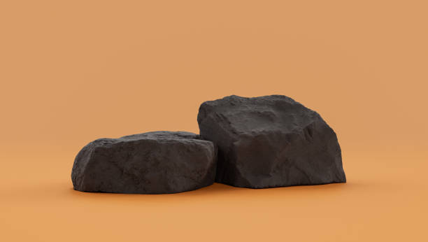 istock Isolated dark rocks in a yellow background  monochrome rock model 1393880808