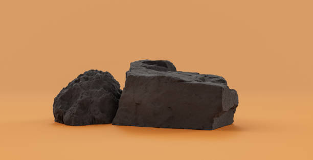 istock Isolated dark rocks in a yellow background  monochrome rock model 1393880841