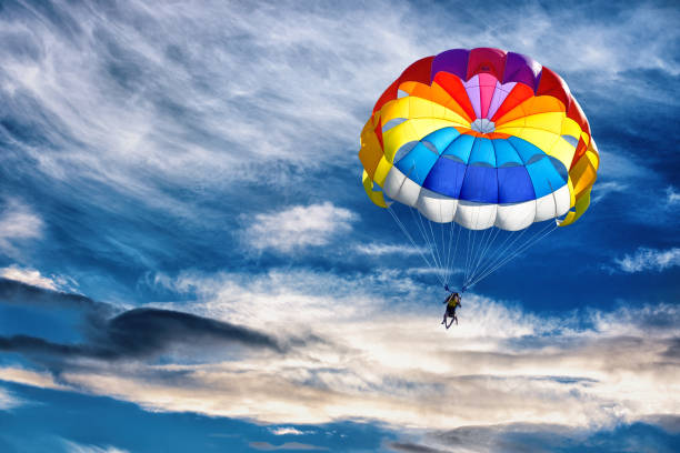 gliding with a parachute. - airplane sky extreme sports men imagens e fotografias de stock