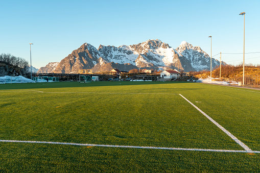 Henningsvaer  Vagan Nordland Lofoten archipelago Norway . This Football Pitch became a little famous because of its Location. I was there latest in 2017, this is a fishing village and tourist town located on Austvagoya island.