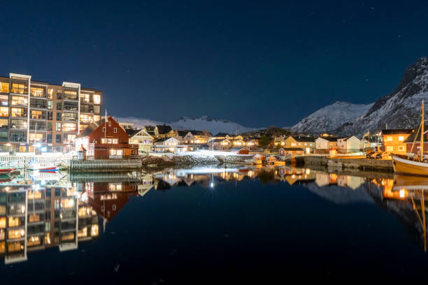 Svolvaer by dusk in Vagan Nordland Lofoten archipelago  North of Norway . Svolvaer by dusk in Austvagoya island Vagan Nordland Lofoten archipelago  North of Norway . View from the island of Lamholmen, in the middle of Svolvær Harbour. harbor of svolvaer in winter lofoten islands norway stock pictures, royalty-free photos & images
