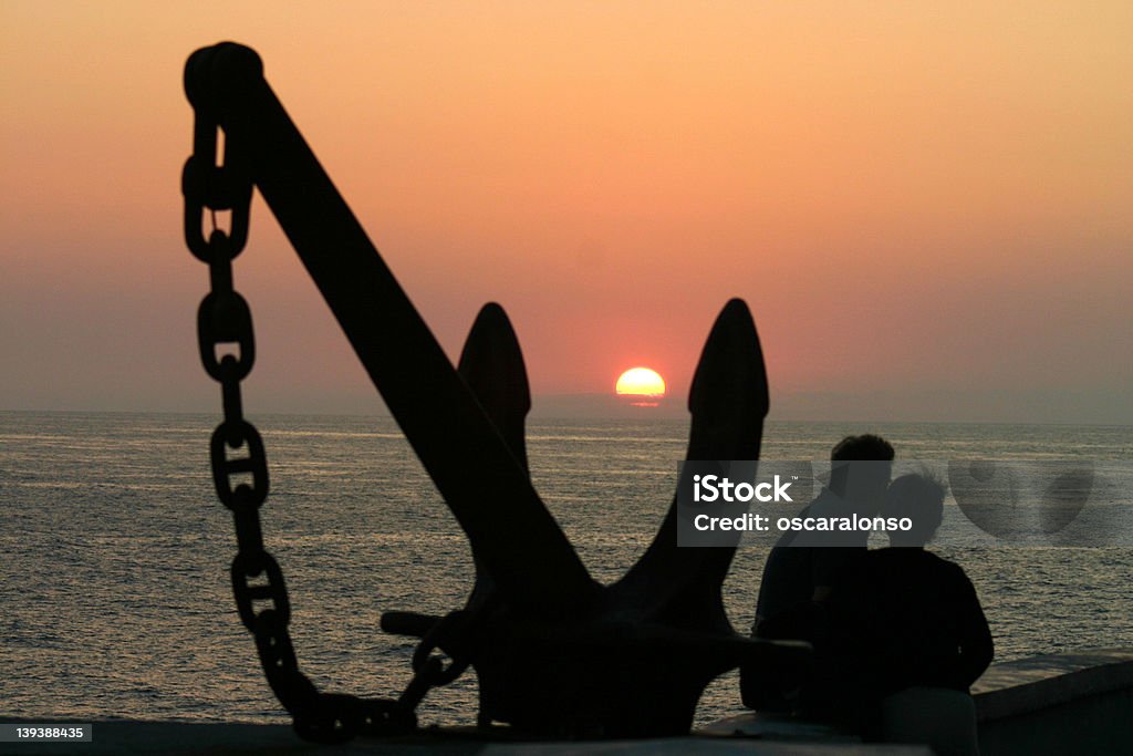 Ancora e tramonto - Foto stock royalty-free di Ancora