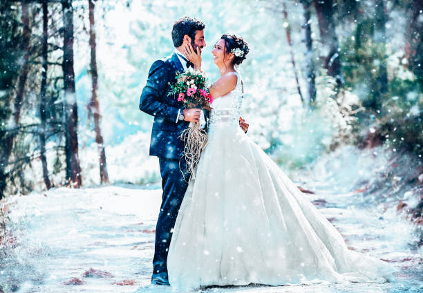 istock Wedding couple posing in forest. 1393886223