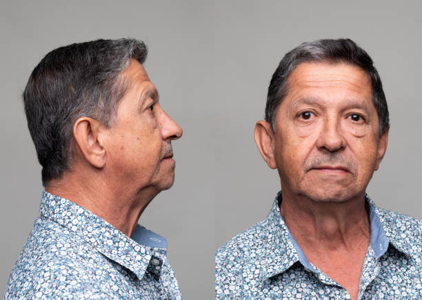 istock Hispanic senior man front and profile mugshots 1393890588