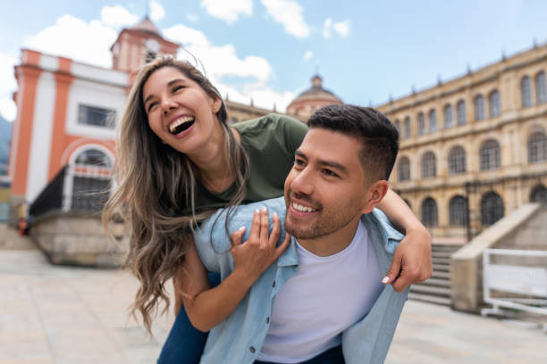 istock Happy piggyback ride while sightseeing in Bogota 1393890828