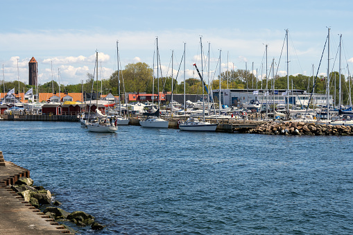 Helsingborg, Sweden - May 21, 2021: Sailboats in Raa harbour in southern Helsingborg. Popular tourist destination.