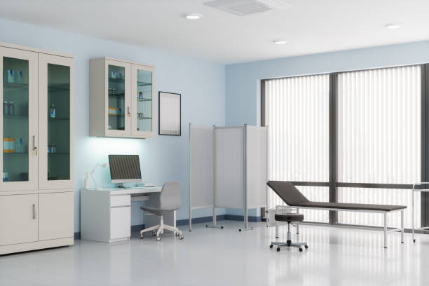 Examination Room In Doctor's Office Doctor's office with desk, cabinets and examination table. medical clinic stock pictures, royalty-free photos & images