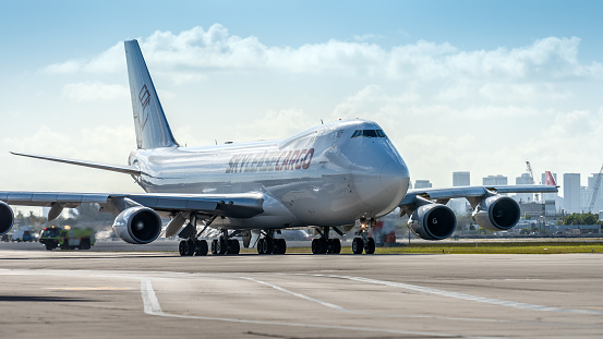 Miami, United States - April 25, 2022: Sky Lease Cargo plane (Boeing 747) at Miami International Airport, ready to take off and transport goods around the world.