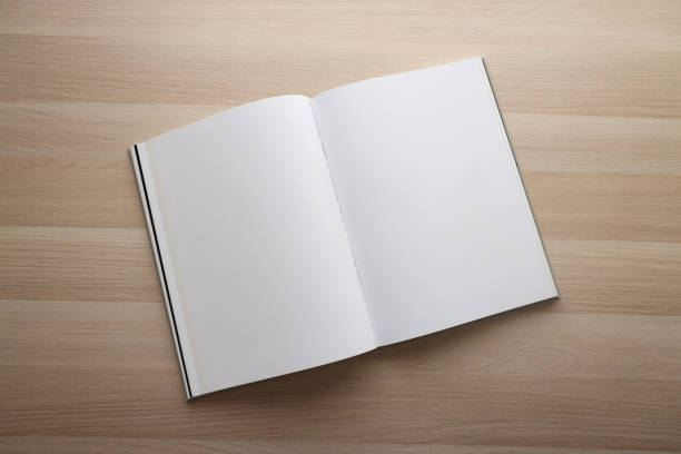 Blank open book on table Blank open book on table spreading stock pictures, royalty-free photos & images