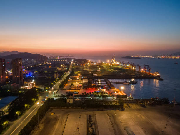 istock As night fell, the brightly lit and busy pier operated 1393901416