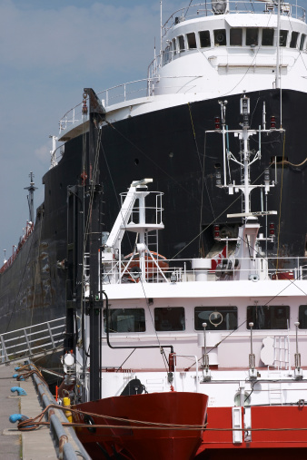 ship and tugboat