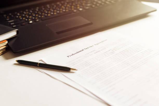 istock business documents with laptop, keyboard and pen. workplace businessman 1393902227
