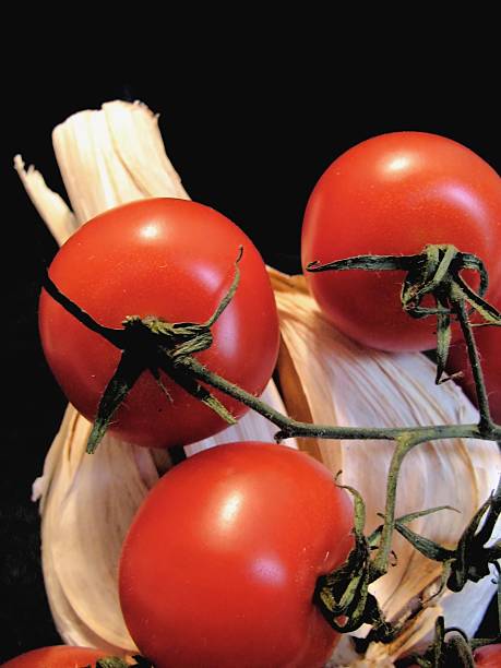 garlic and tomatos stock photo