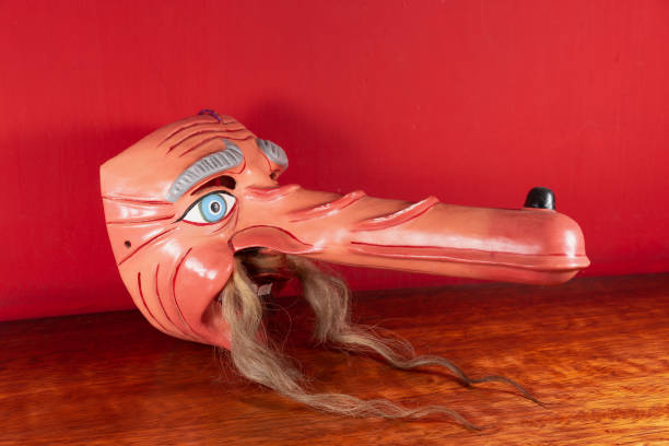 Typical Mask of Cuzco with red background