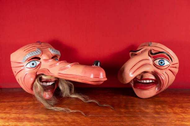 istock Typical Cuzco masks with red background 1393904284