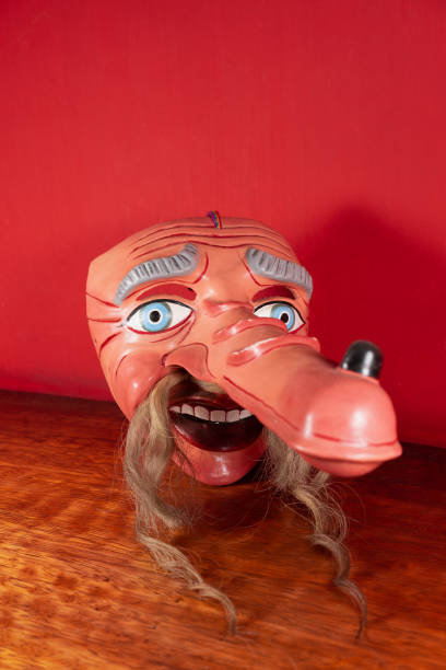 istock Typical Mask of Cuzco with red background 1393904302