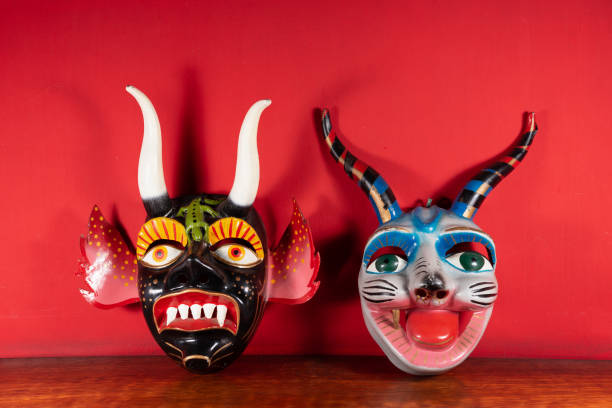 istock Typical Cuzco masks with red background 1393904353